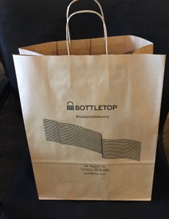Brown printed paper carrier bags size 320x140x420mm